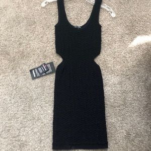 BeBe bodycon black dress w side cut out Sz S